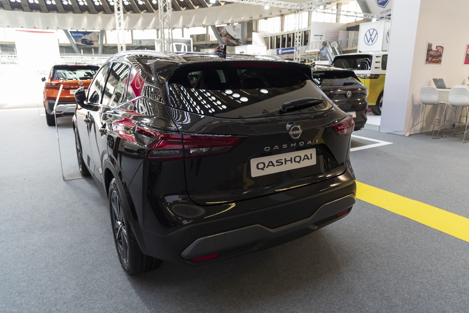 Rear view of a black SUV with distinctive taillights and tinted windows