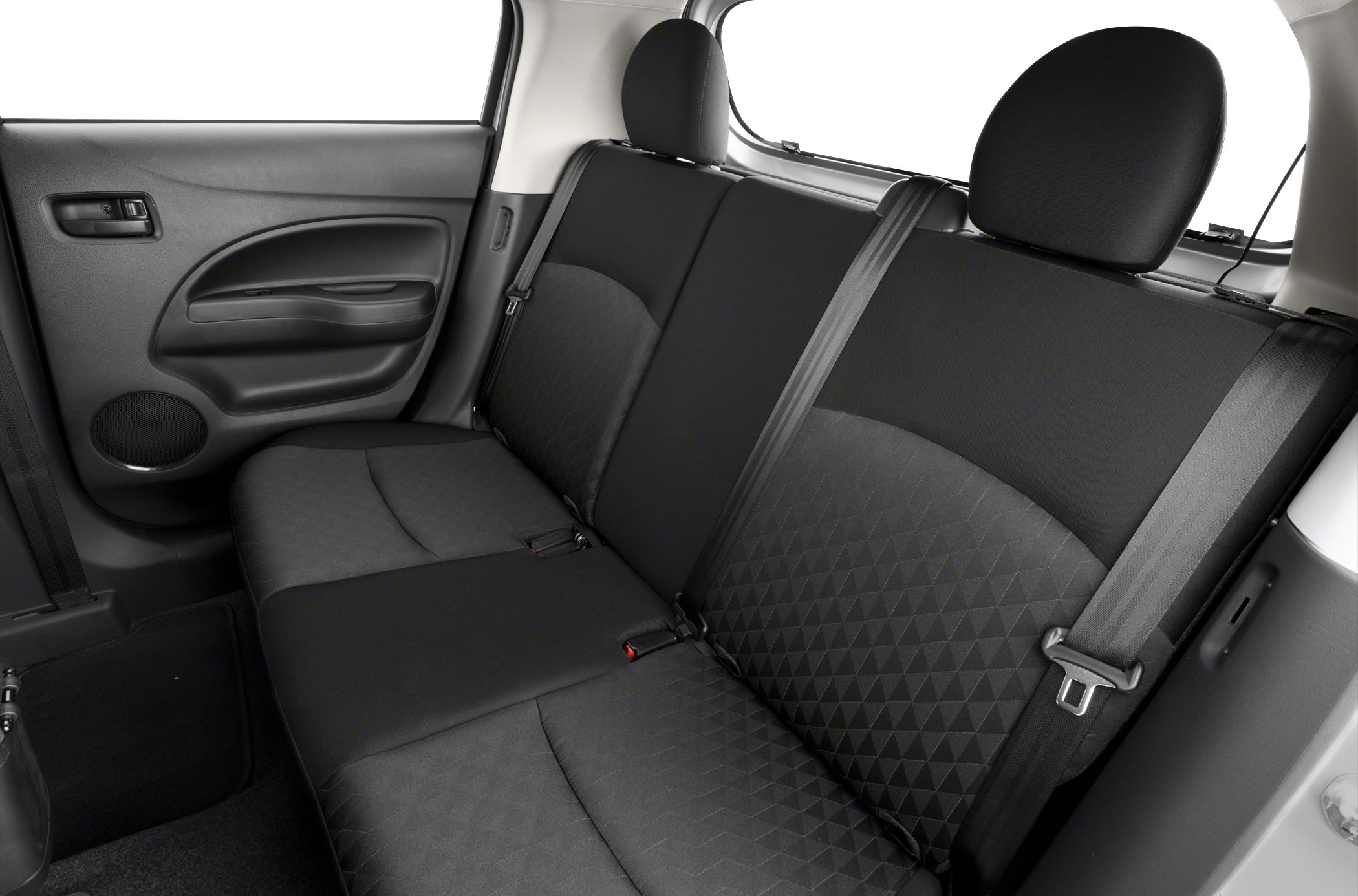 Rear seat interior with black upholstery and seatbelts