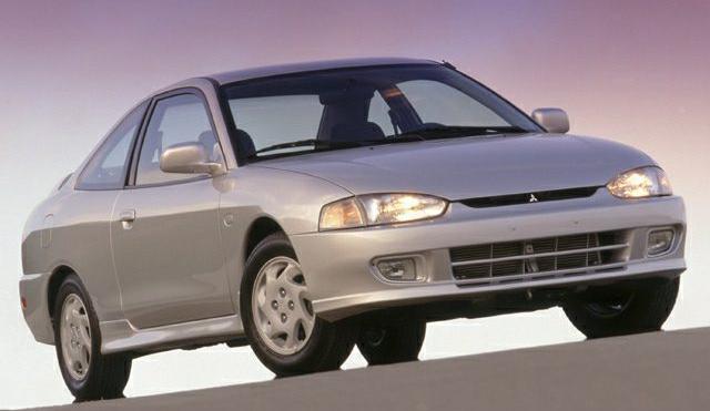 Front three-quarter view of a compact two-door coupe with sleek design and alloy wheels