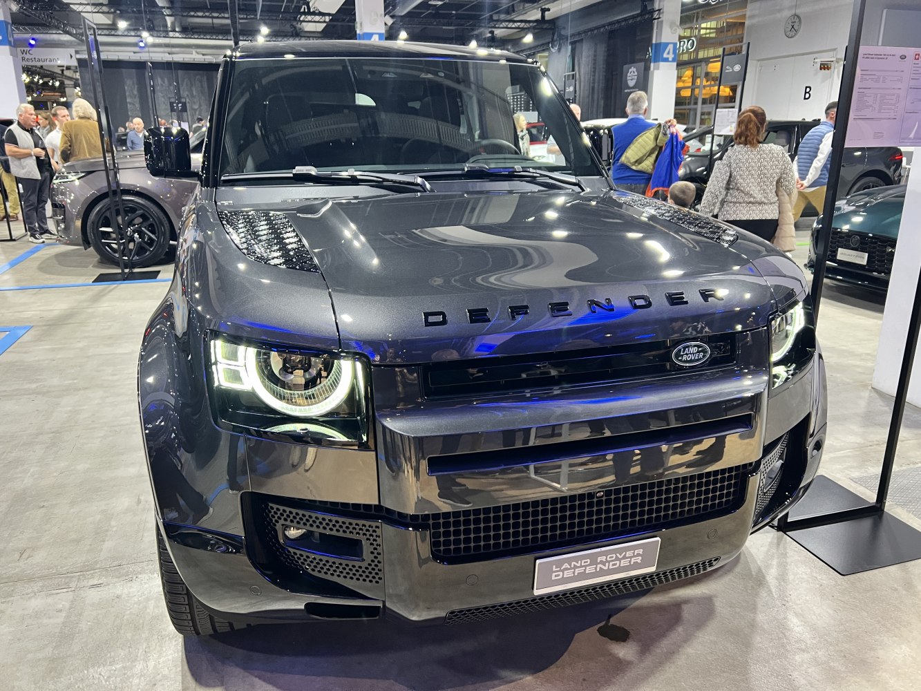 Front view of SUV with modern LED headlights and bold grille