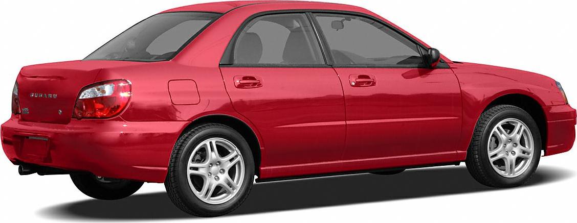 Side view of red sedan with alloy wheels