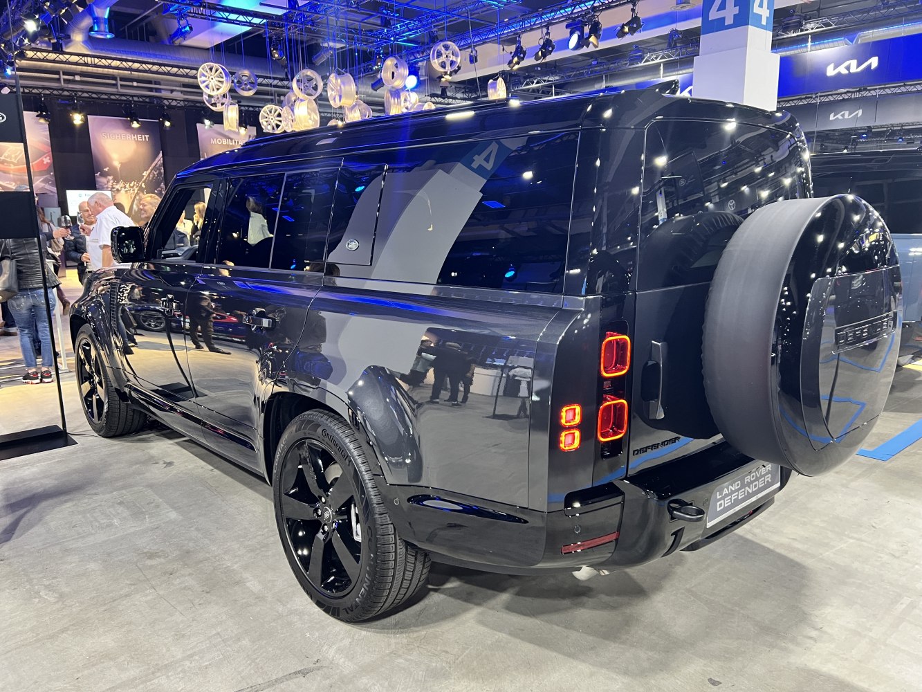 Rear-side view with taillights and spare tire cover