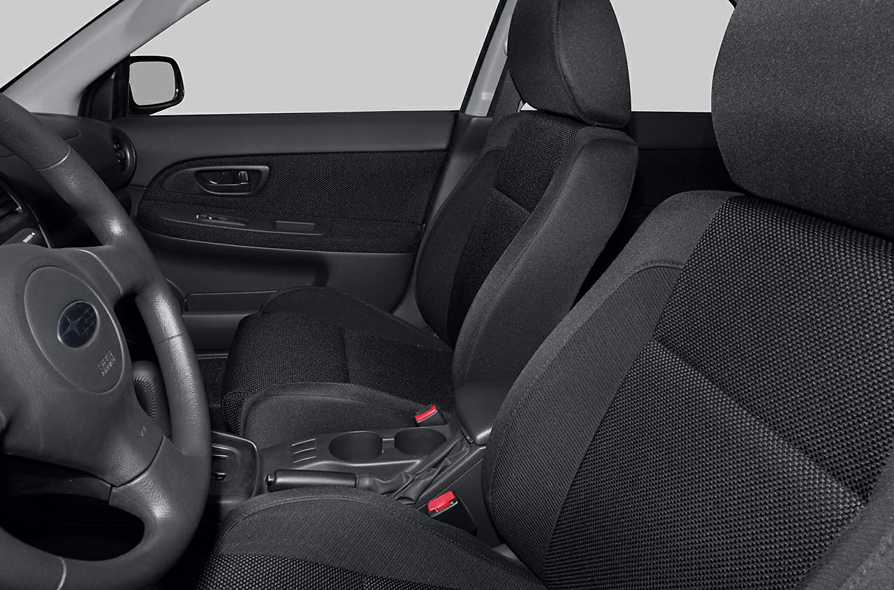 Front seats and door panel with black fabric upholstery