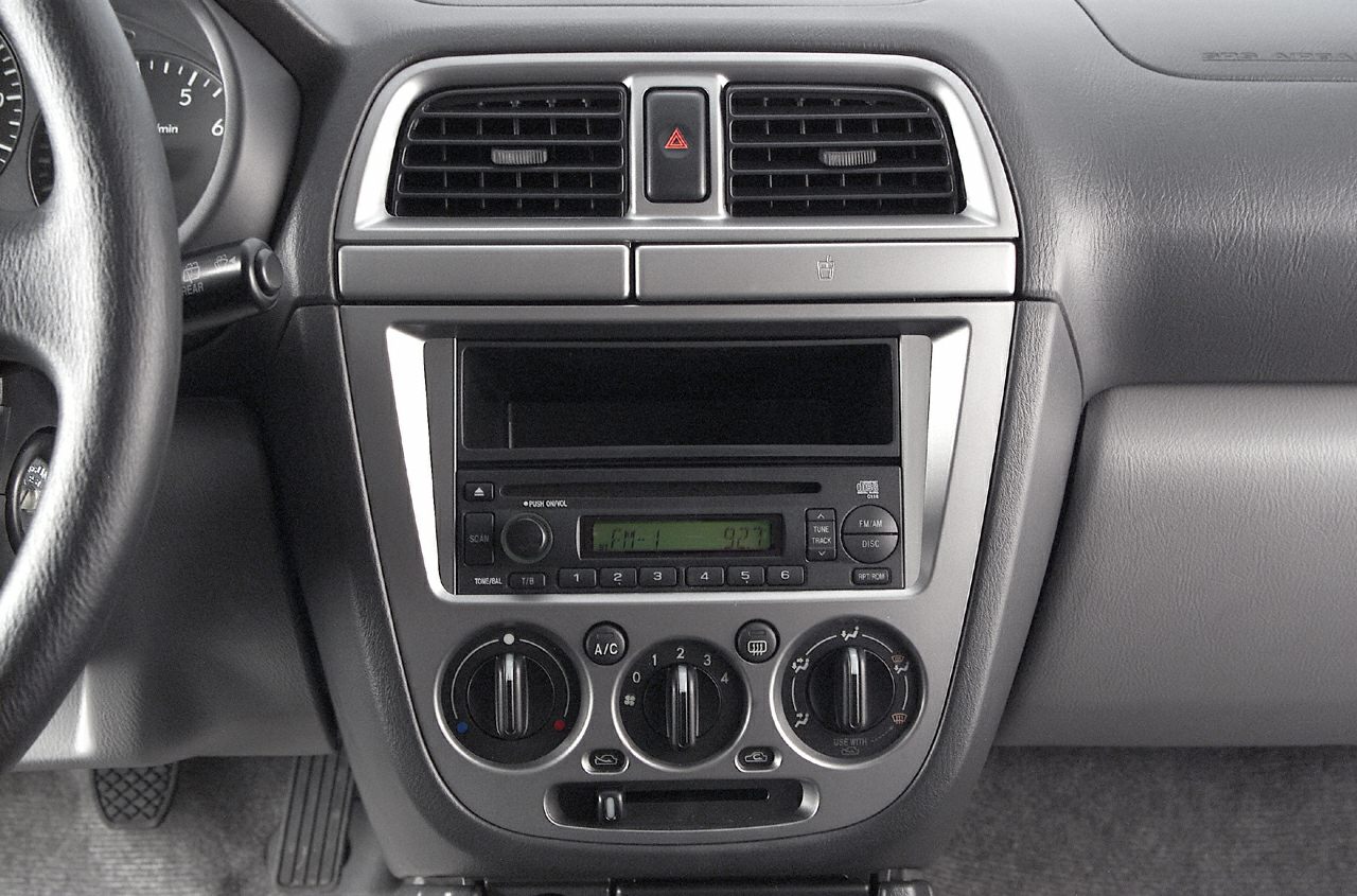 Dashboard center console with air vents, audio system, and climate controls.
