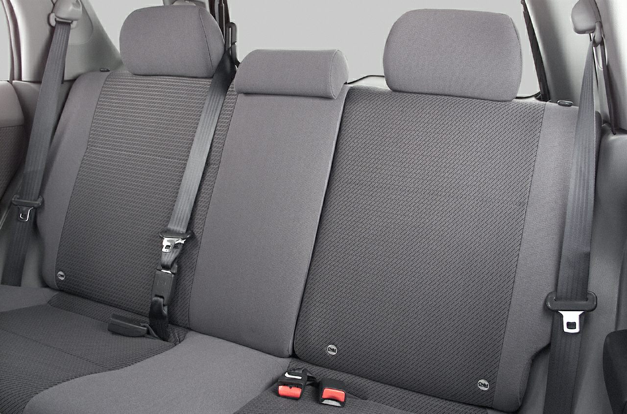 Rear fabric seats and seatbelt setup in a mid-size vehicle
