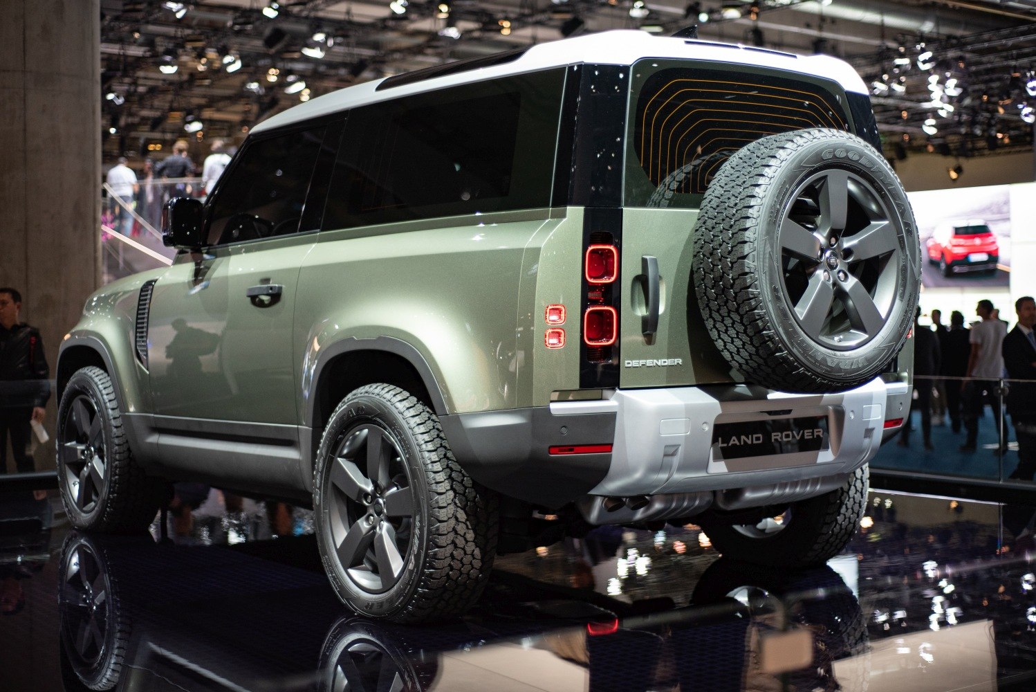 Rear side view with off-road tires and spare wheel