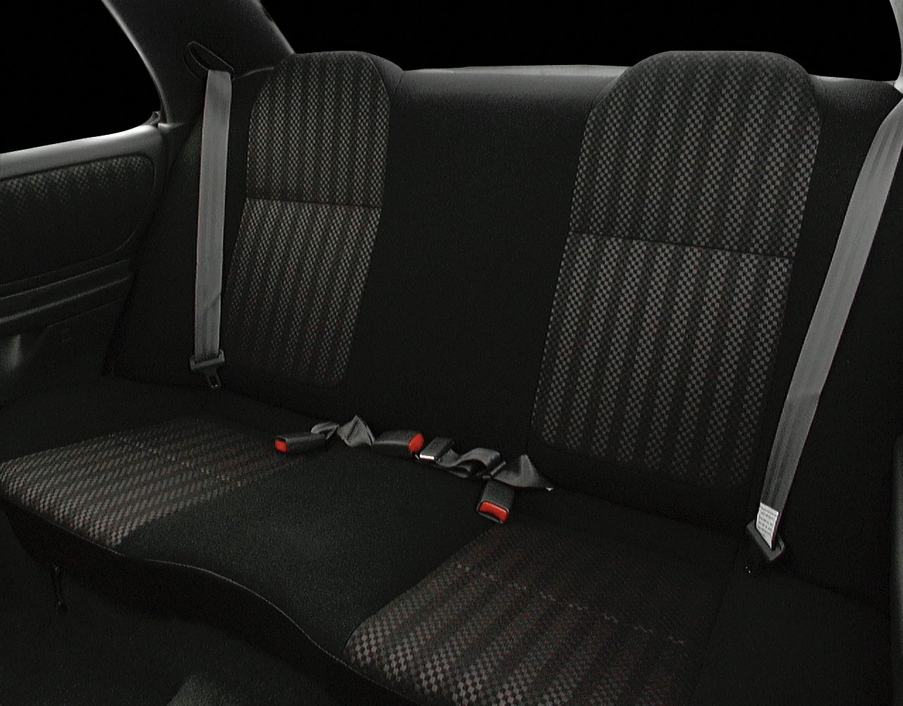 Rear seat with patterned fabric upholstery and seatbelts