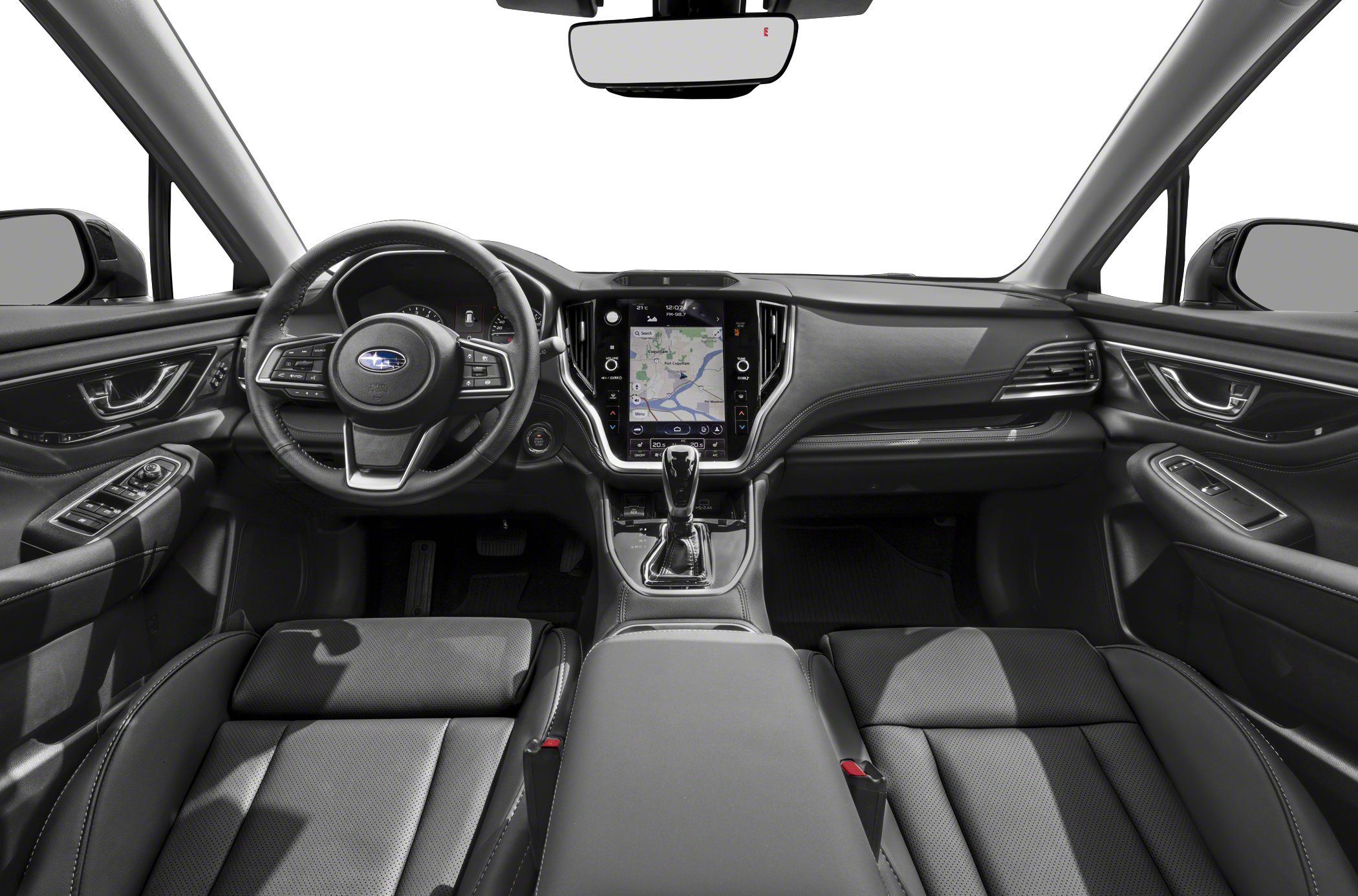 Modern car interior with dashboard, touchscreen, and steering wheel