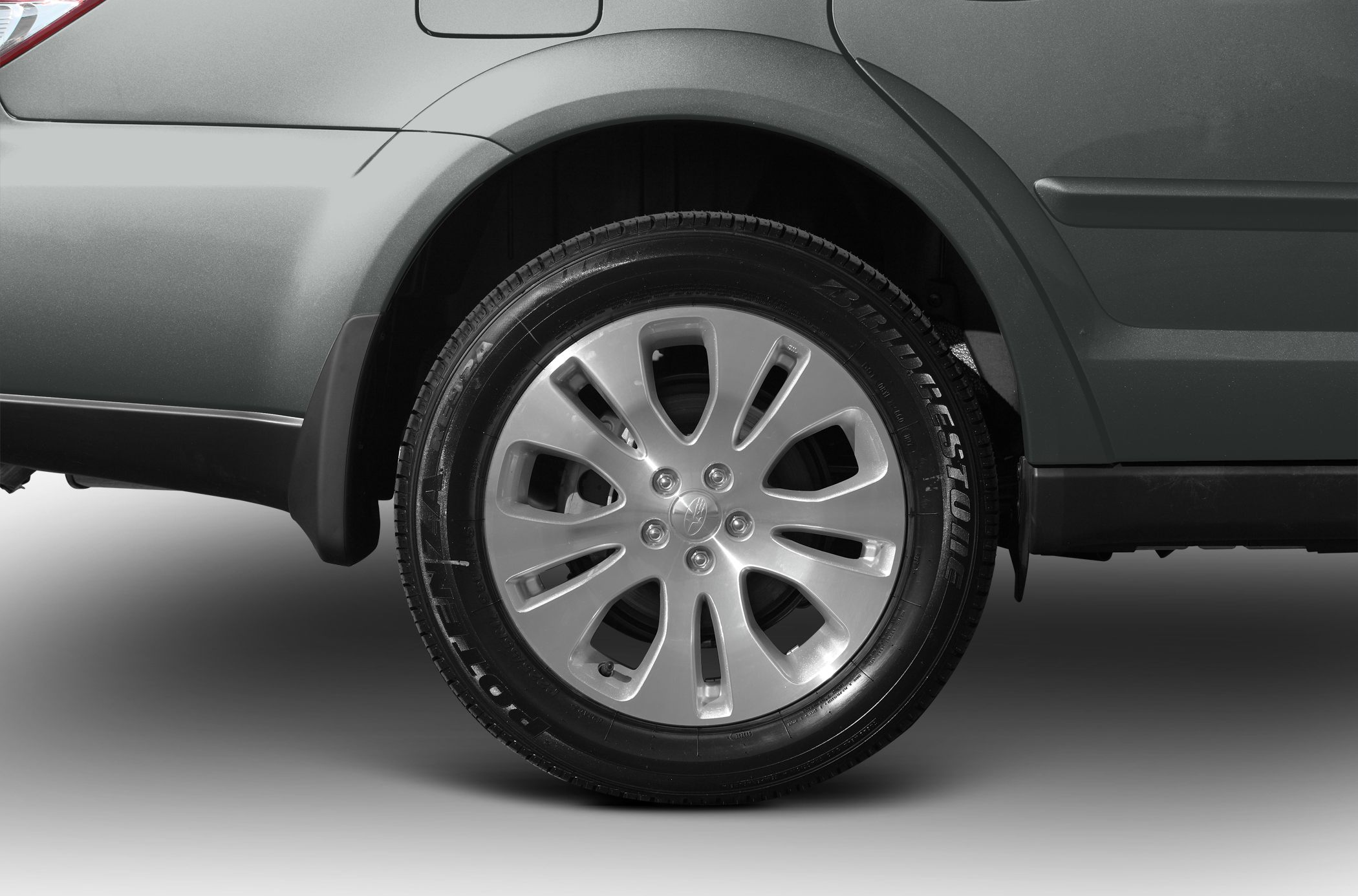 Close-up of alloy wheel and tire on mid-size SUV