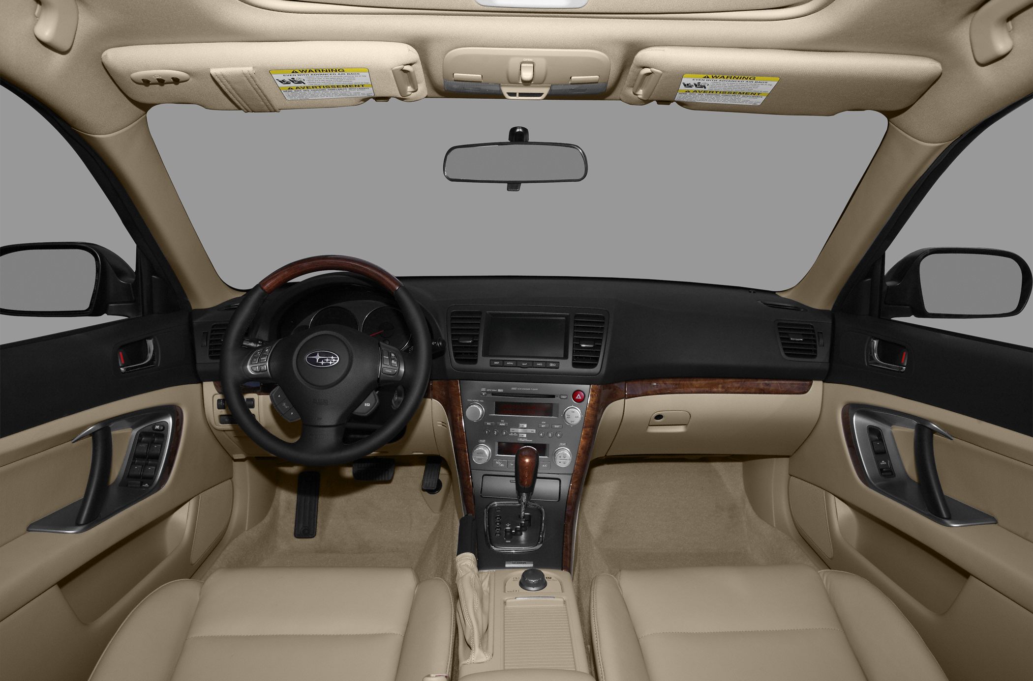 Beige interior with wood trim and central dashboard display