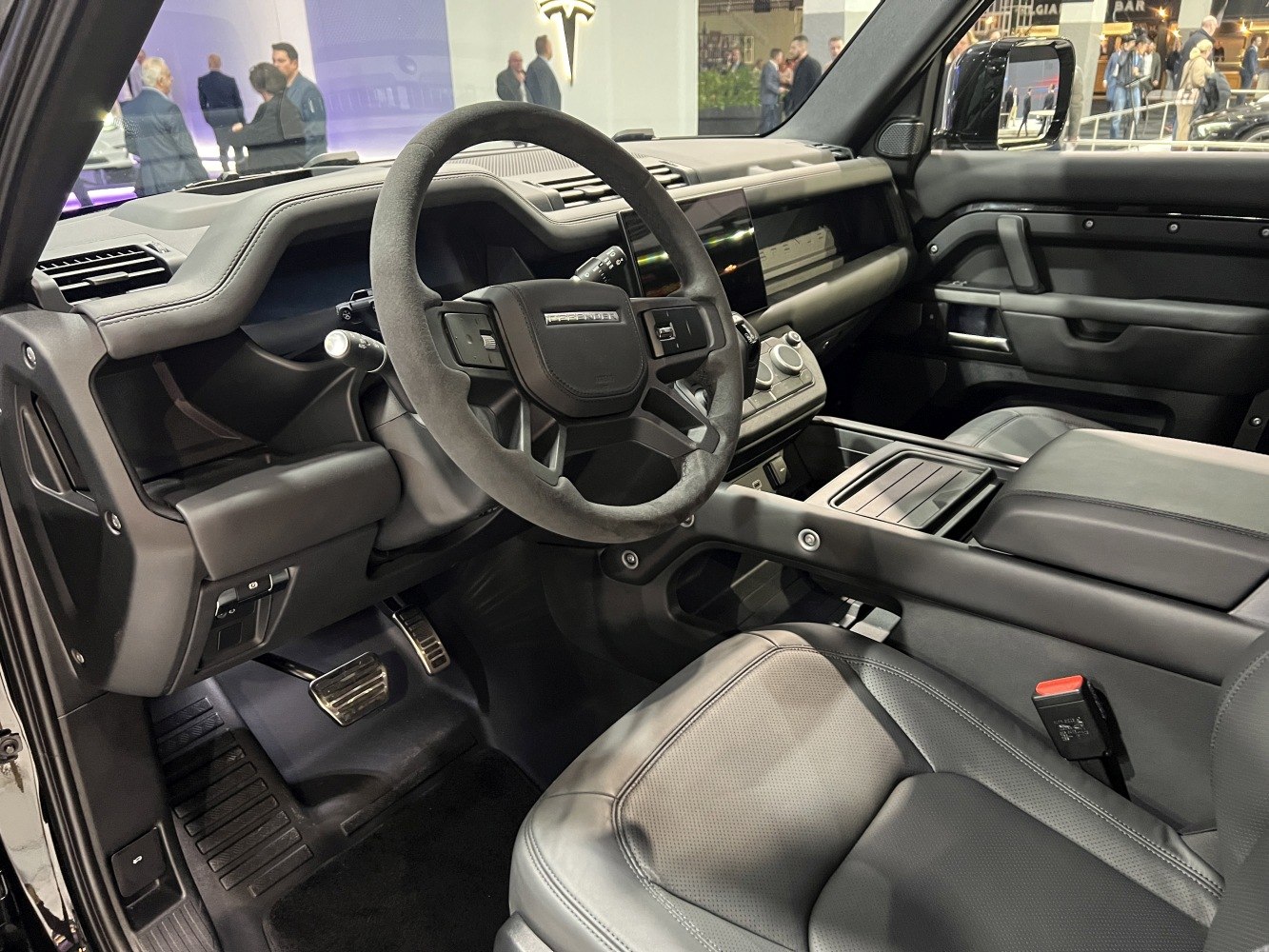Steering wheel and dashboard with premium leather seats and center console