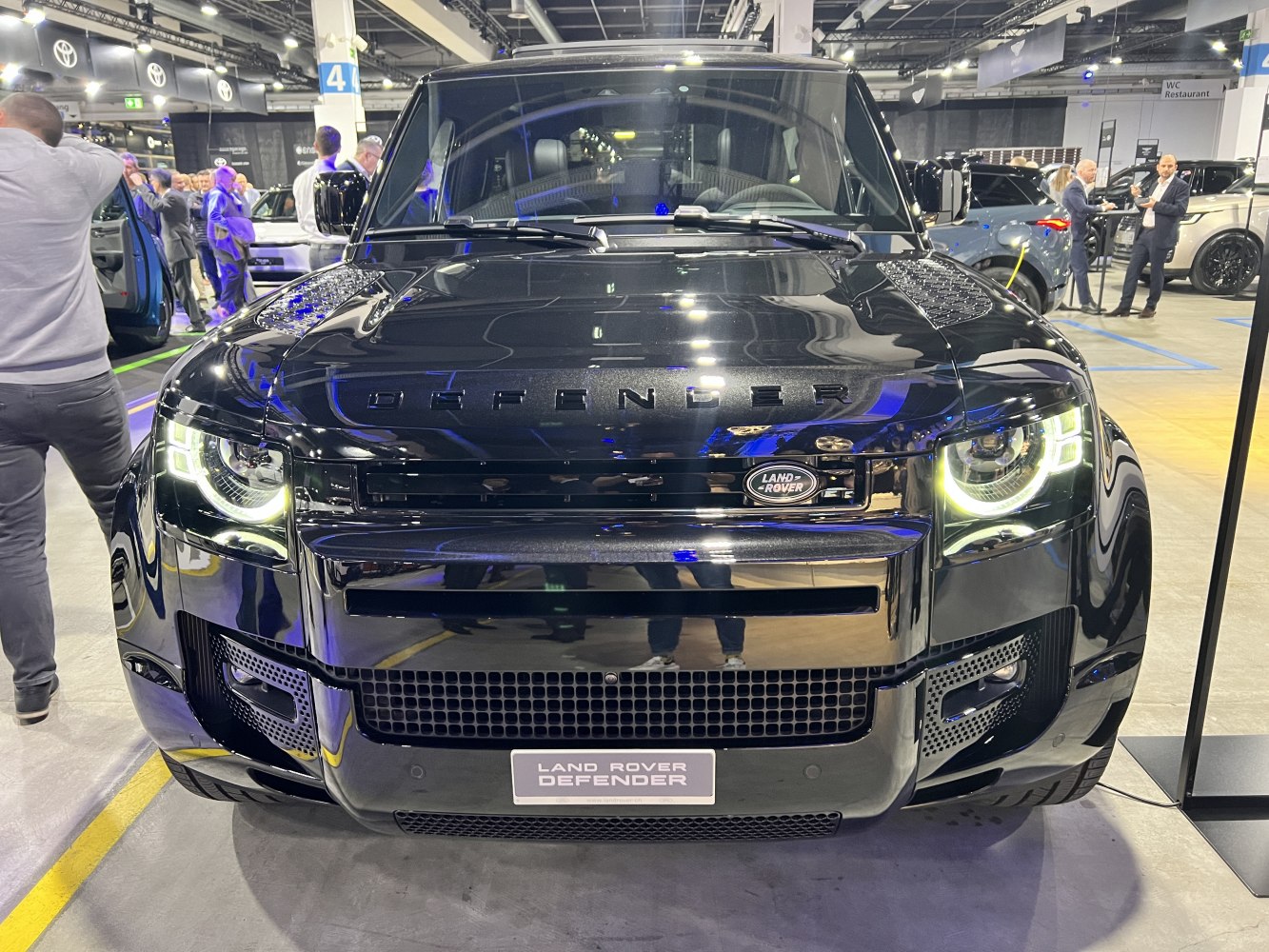 Front view with LED headlights and bold grille