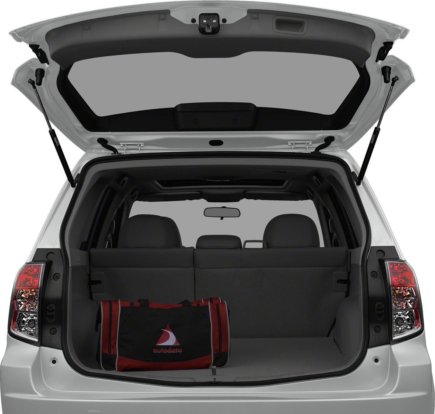 Open rear cargo space with folded seats and duffel bag