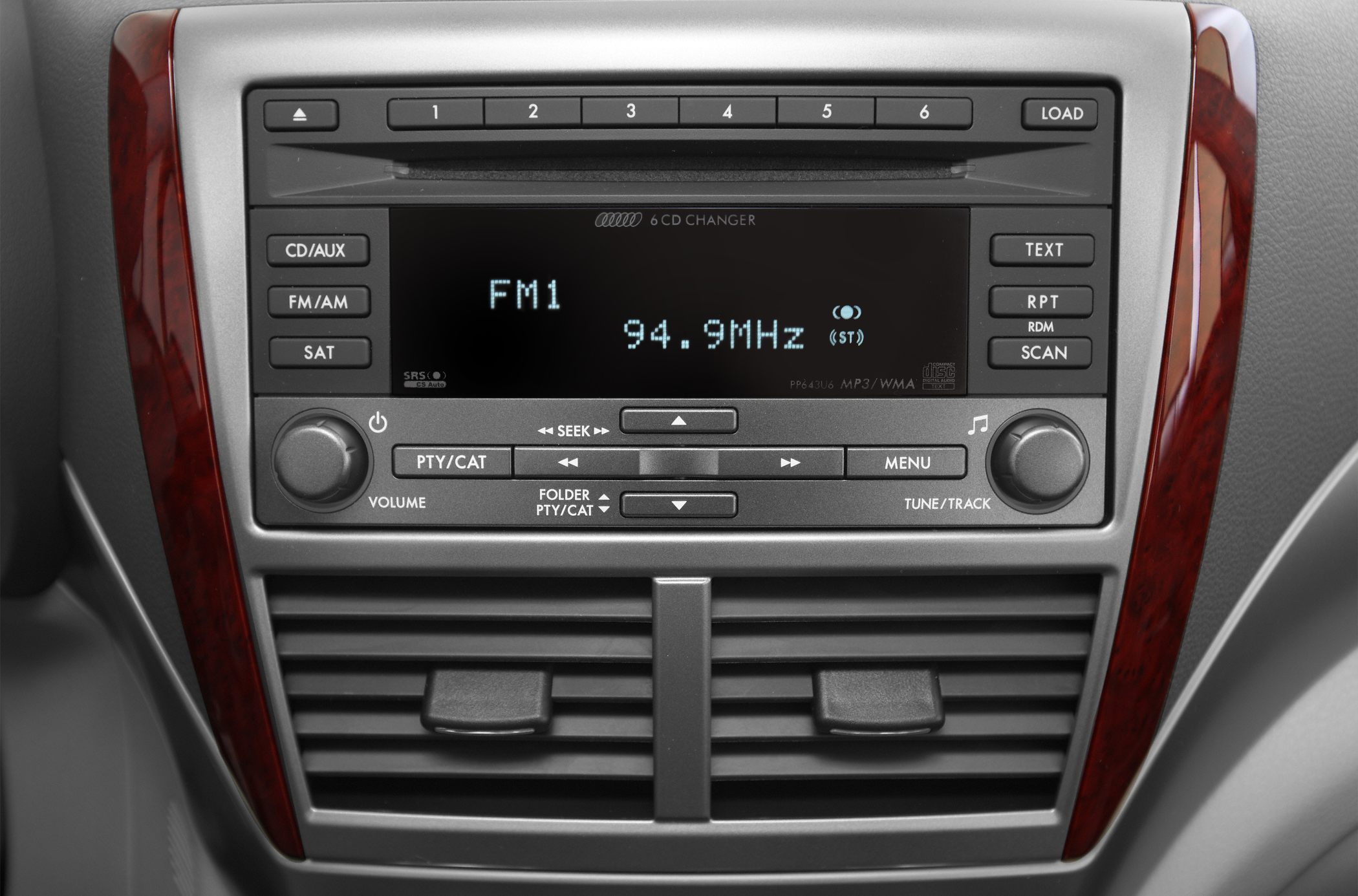 Car stereo system and air vents with wood trim details