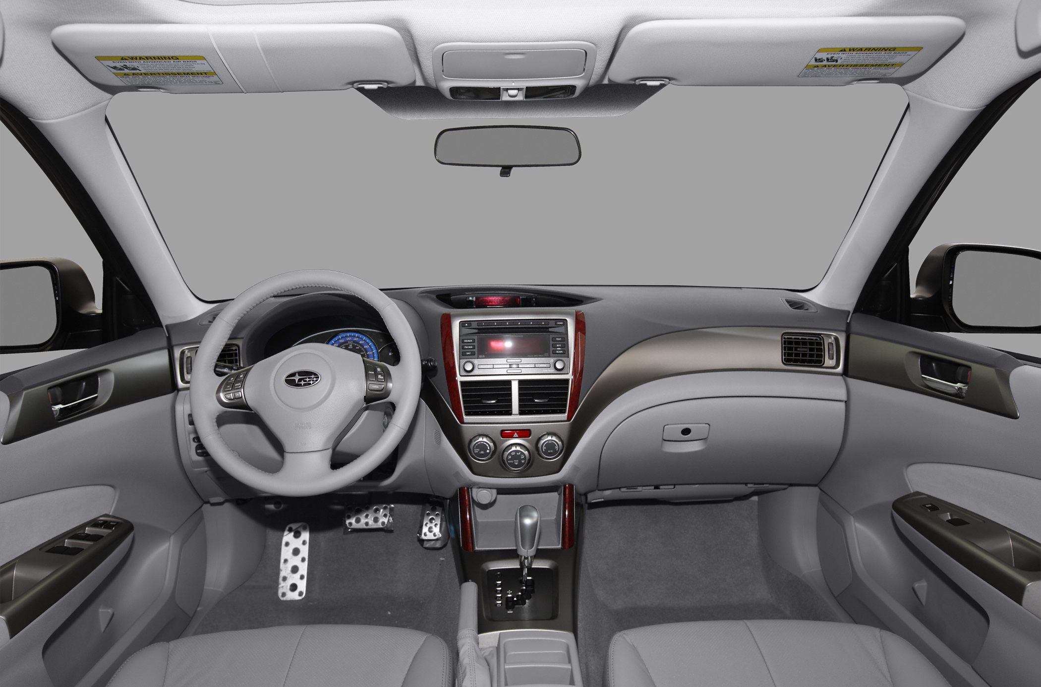Modern car interior dashboard with steering wheel and center console