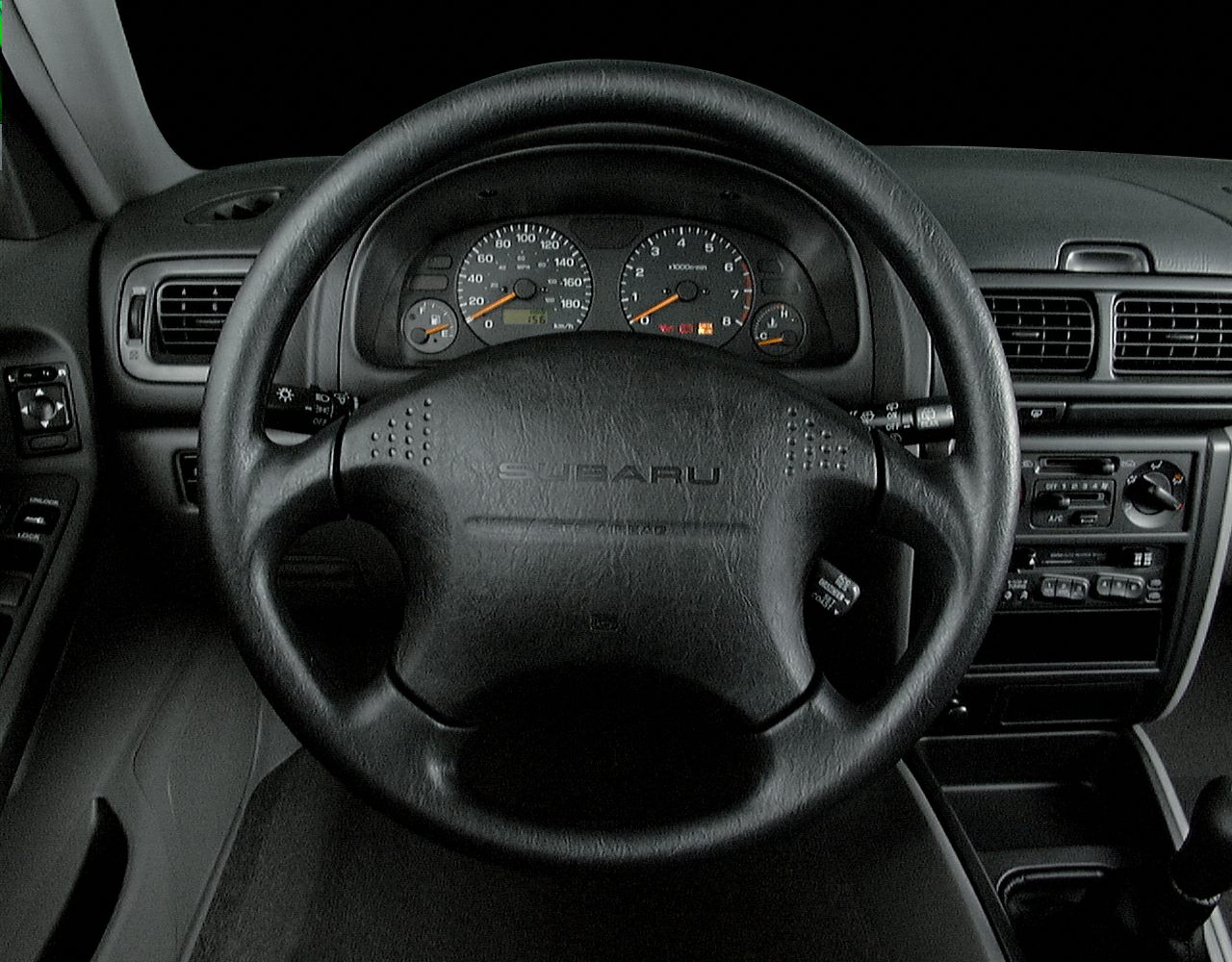 Steering wheel with instrument cluster and center console