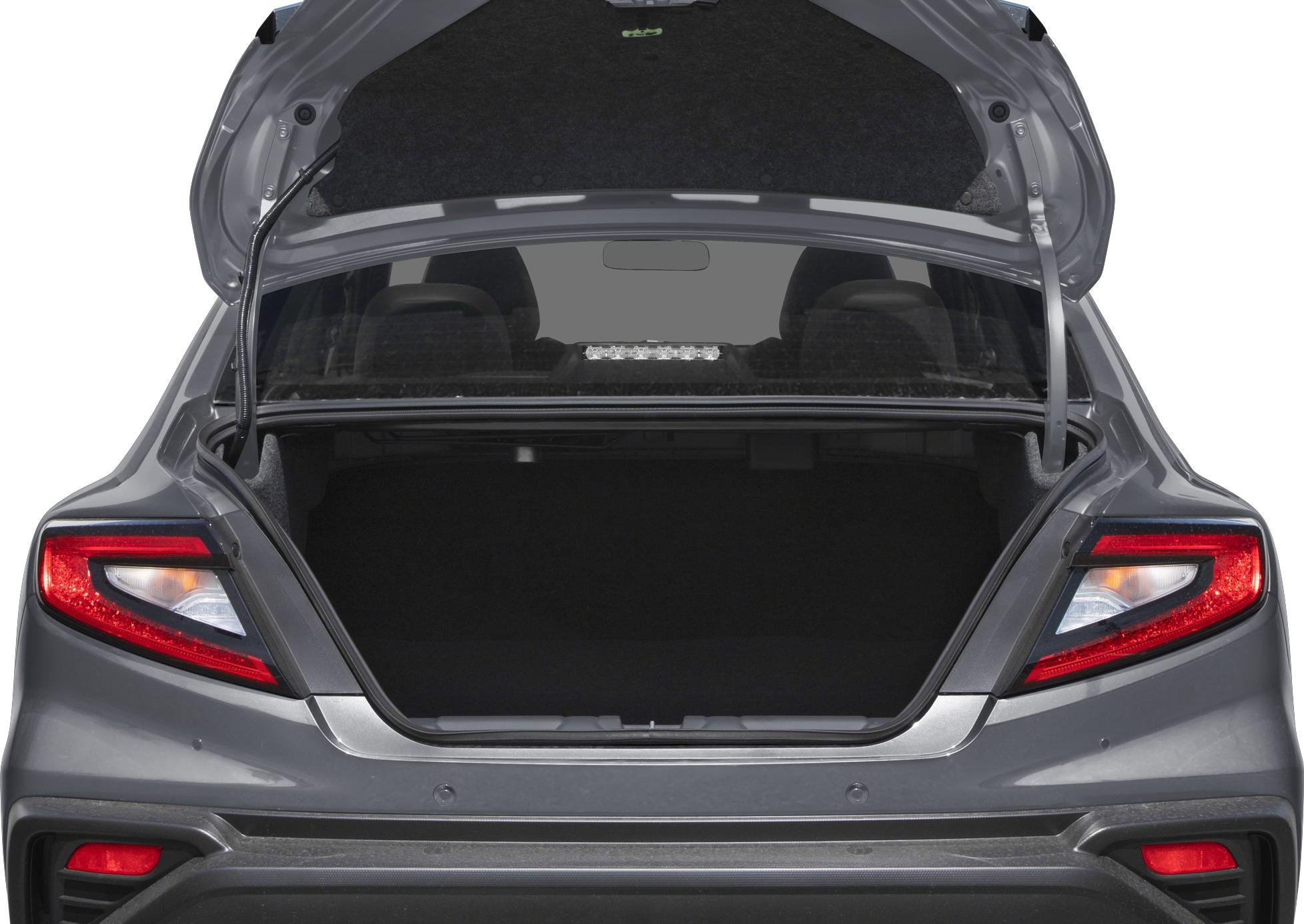 Open trunk rear view with taillights and spacious interior