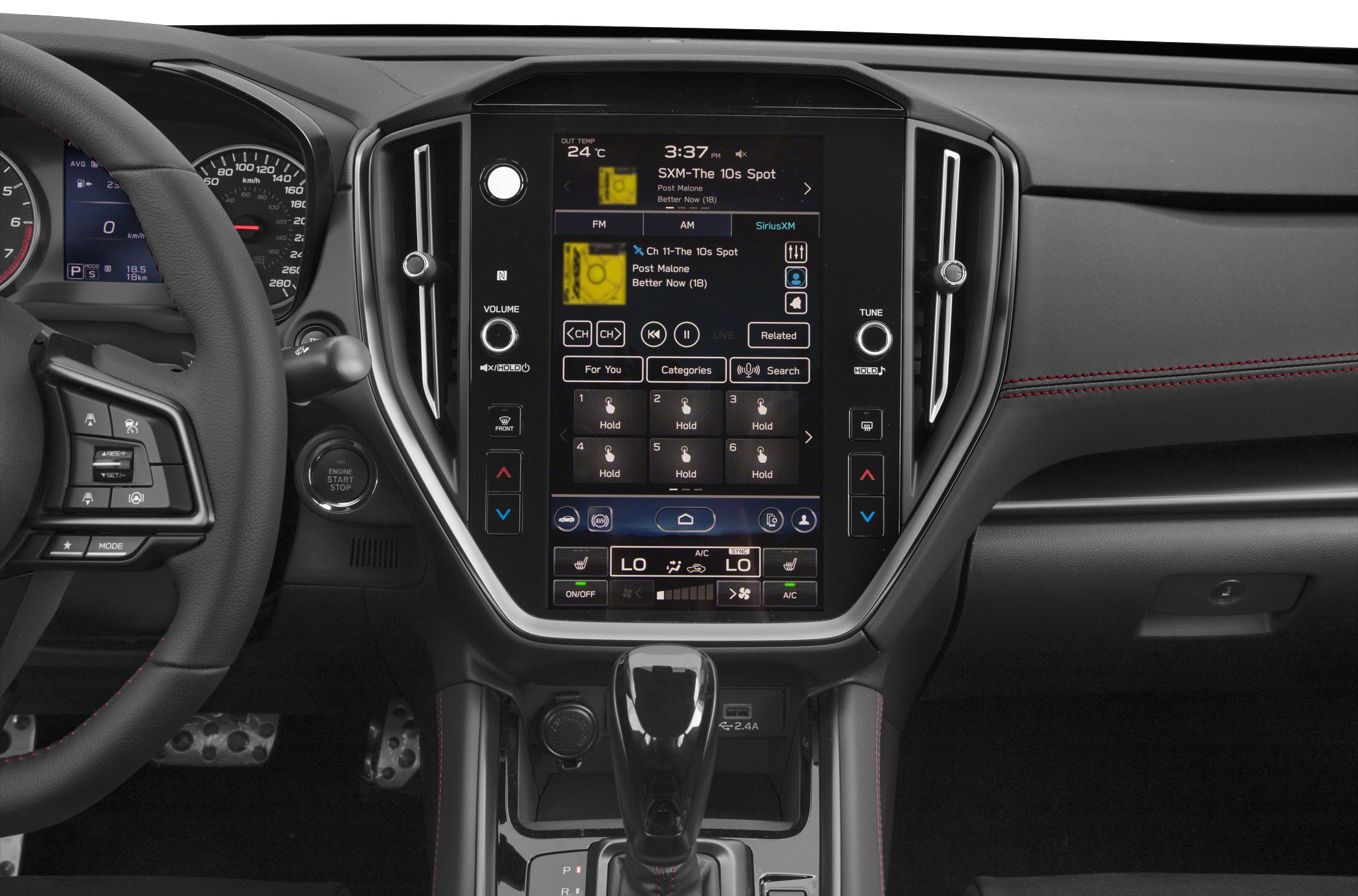 Large touchscreen infotainment system with control panel and gear shifter.