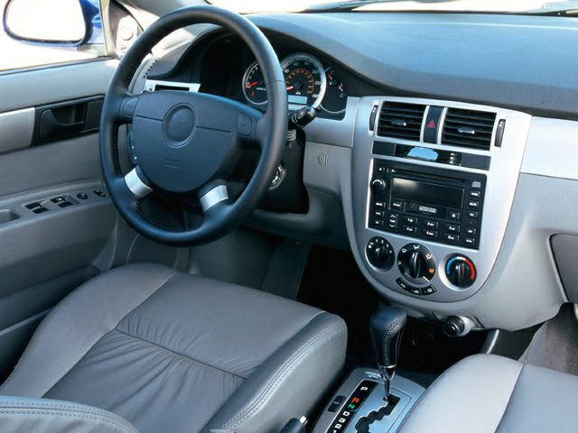Steering wheel and dashboard with center console and gear shift