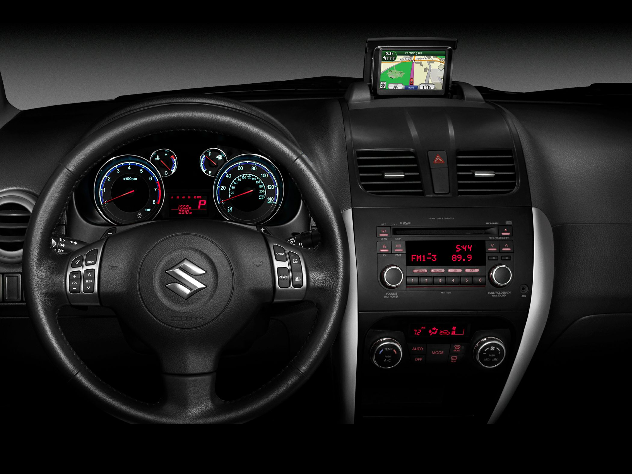 Car interior dashboard with steering wheel controls and pop-up navigation screen
