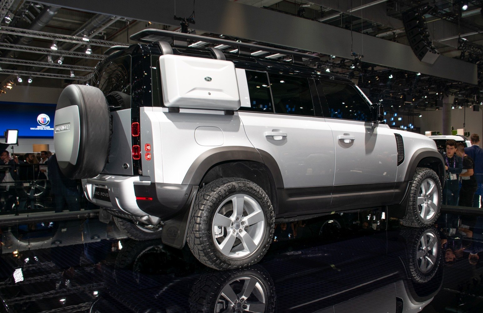 Side and rear view with roof rack and rear spare tire