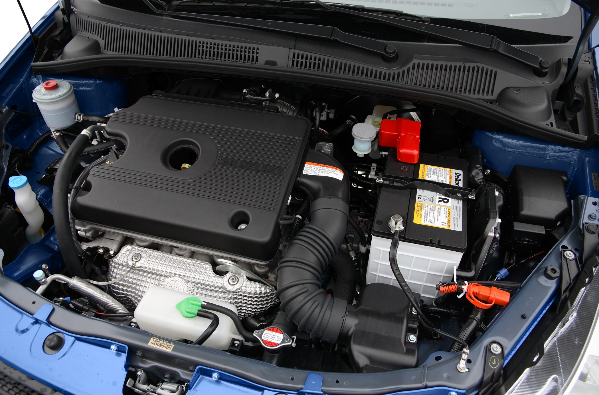 Engine compartment with cover and battery layout