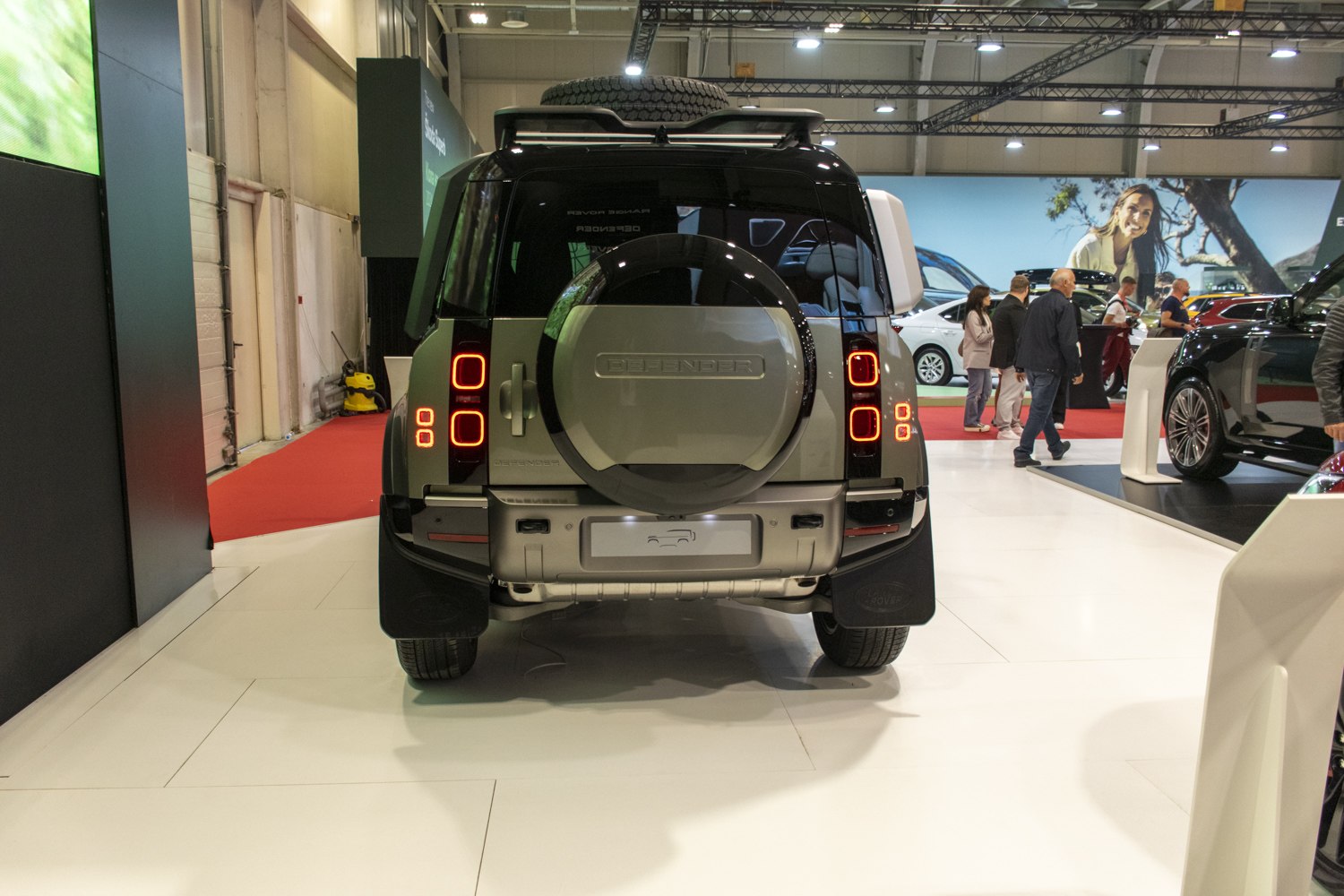 Rear view with spare tire and modern taillights