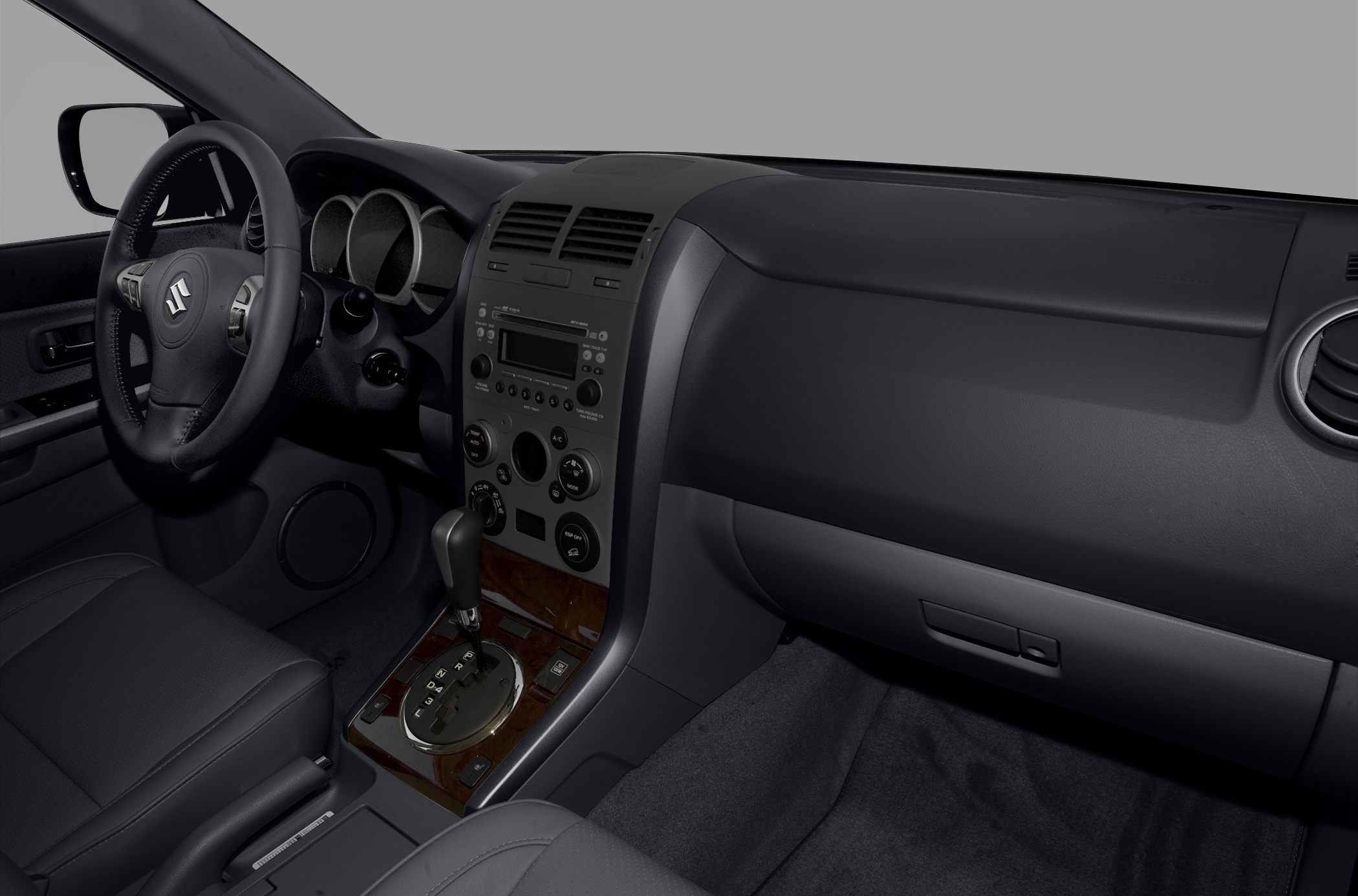 Dashboard and center console with gear shift and steering wheel
