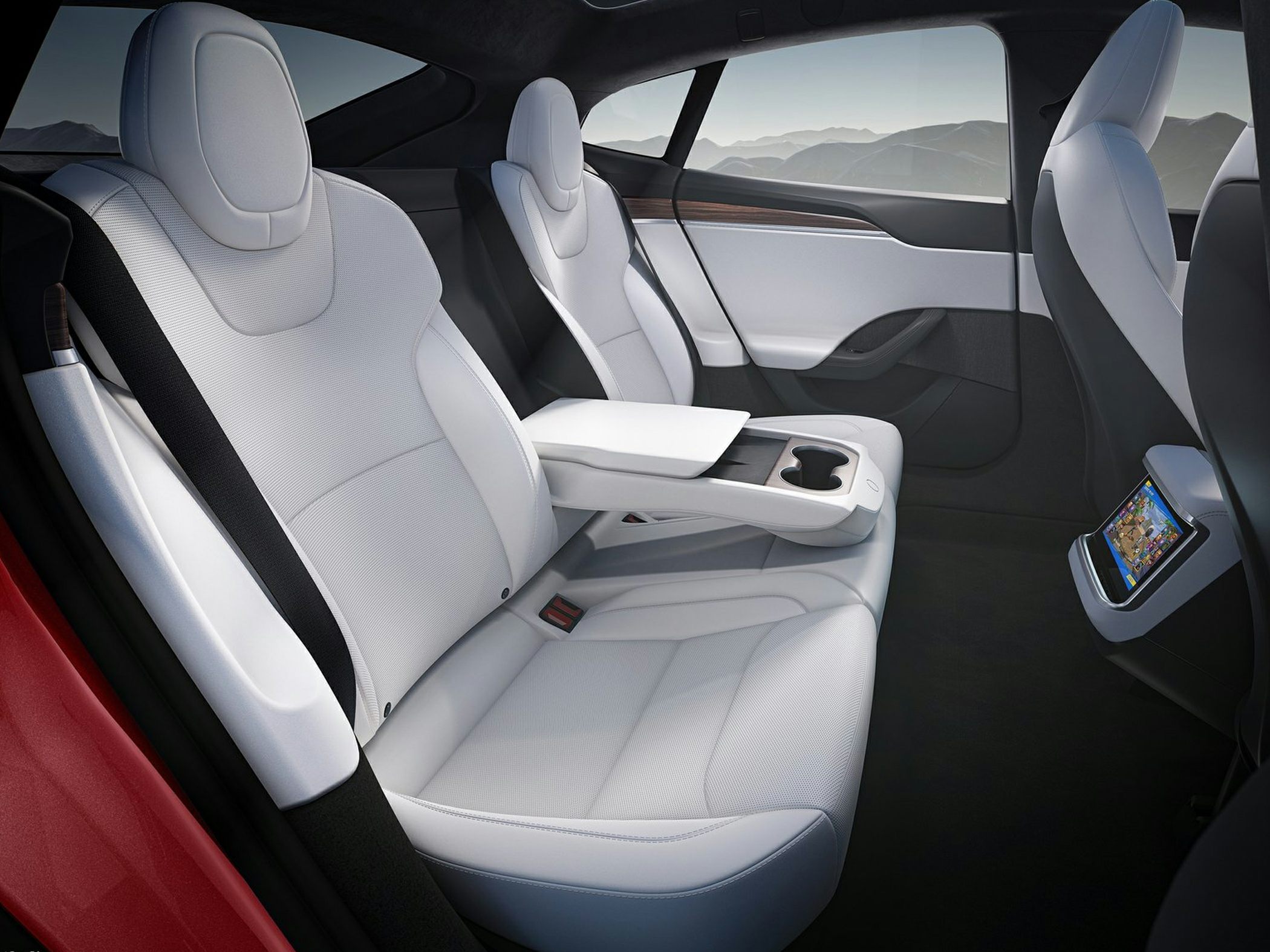 White leather rear seats with center console and touchscreen panel