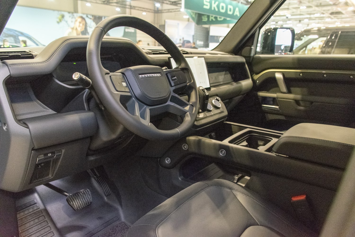 Digital instrument panel and central touchscreen in modern SUV interior