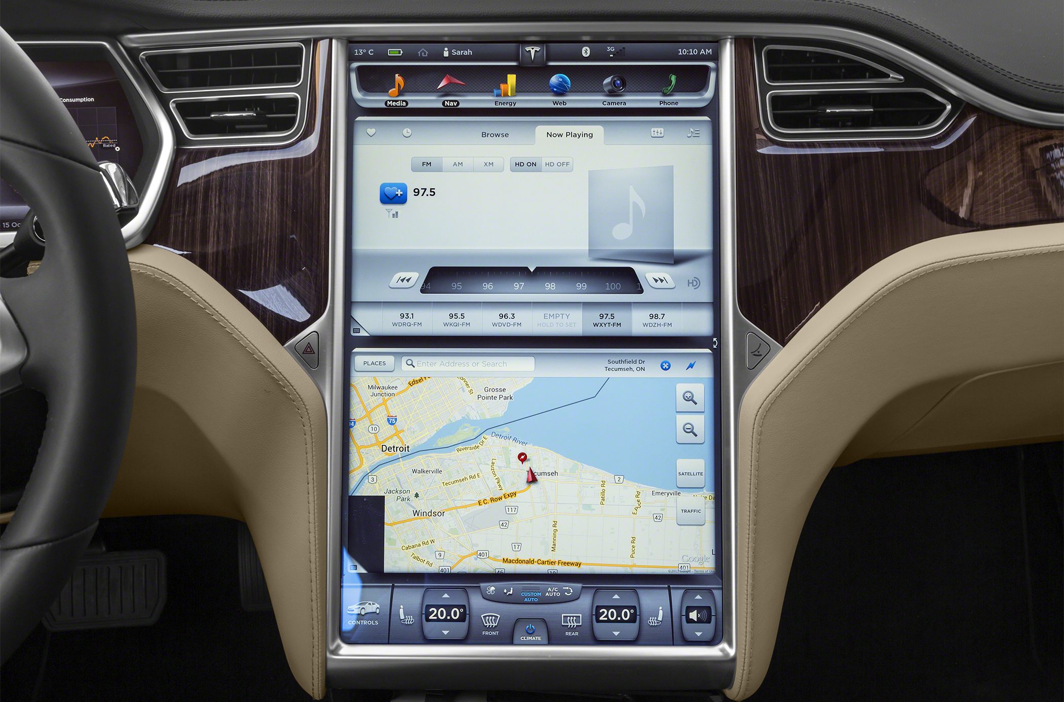 Large vertical touchscreen display with navigation and multimedia controls
