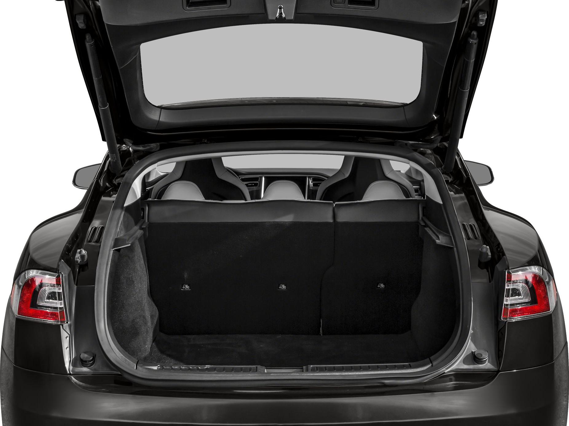 Open rear trunk of a hatchback with visible rear seats