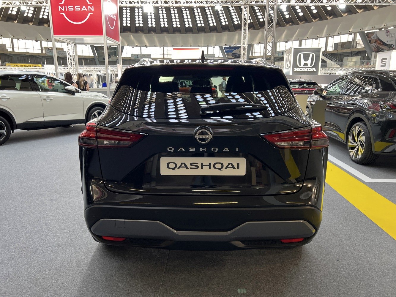 Rear view with sleek taillights and rear window of a modern SUV