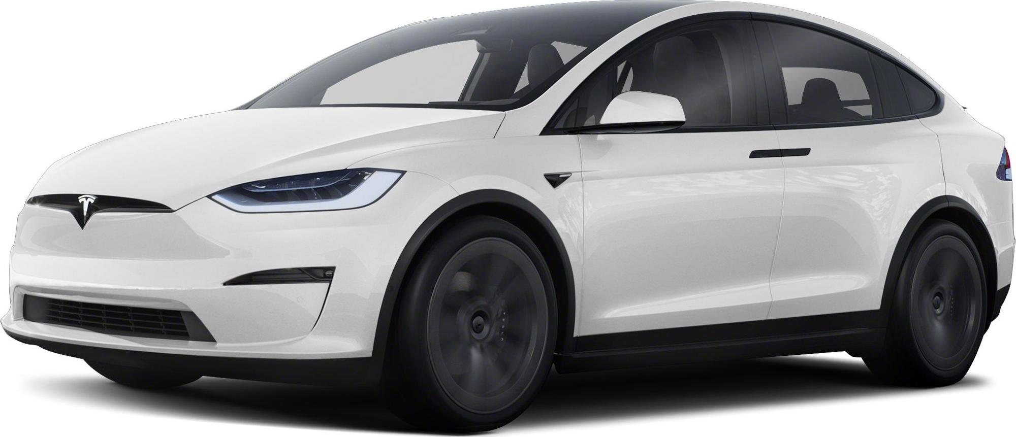 White electric SUV front-side view with sleek headlights and aerodynamic design
