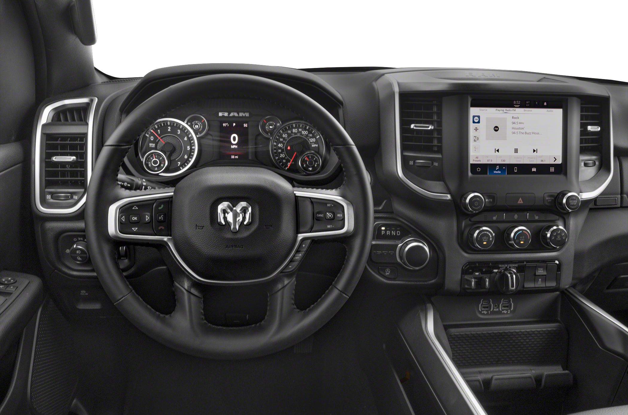 Steering wheel with controls, digital gauge cluster, touchscreen infotainment