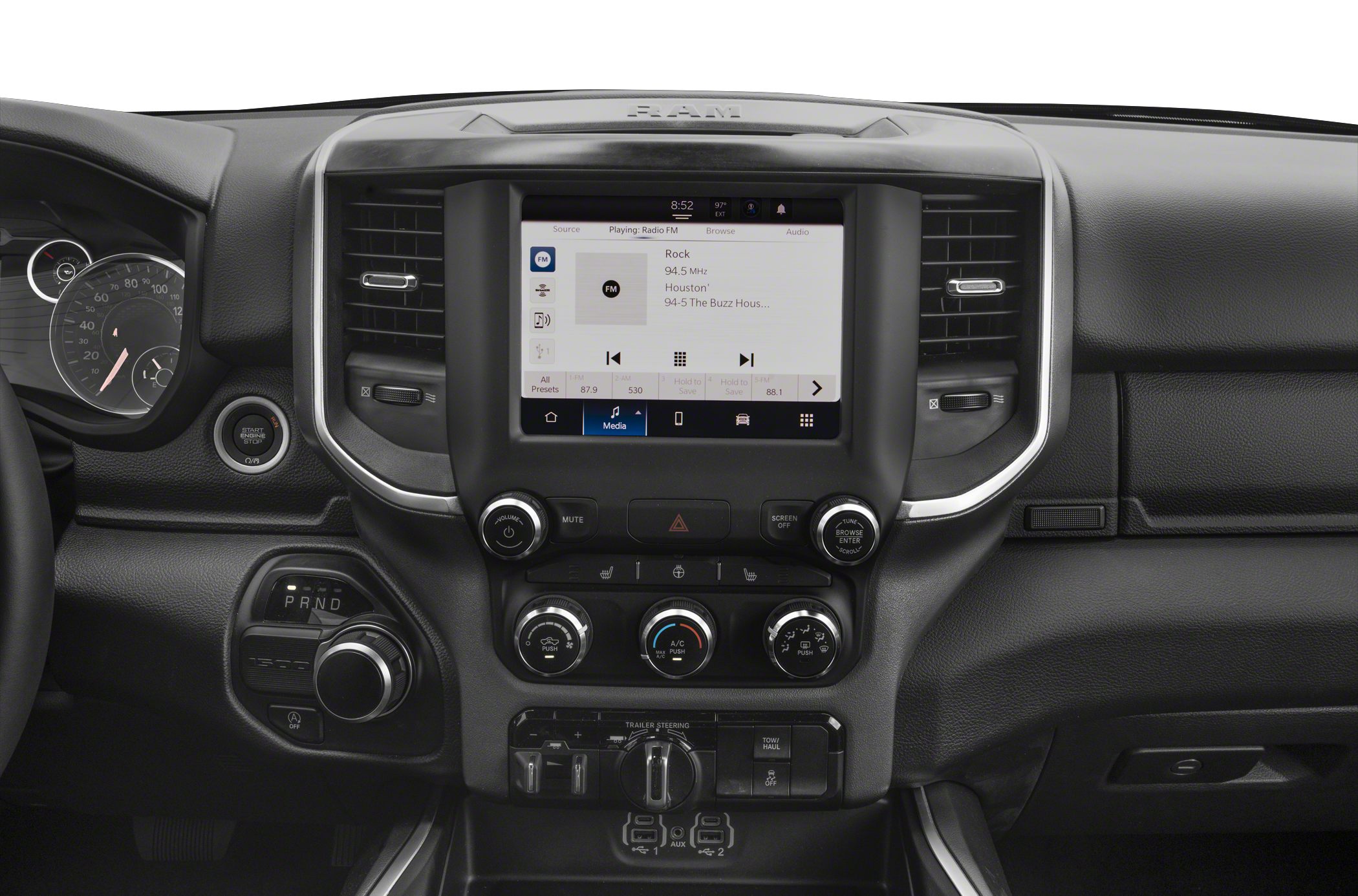 Dashboard with infotainment screen, rotary gear selector, and climate controls