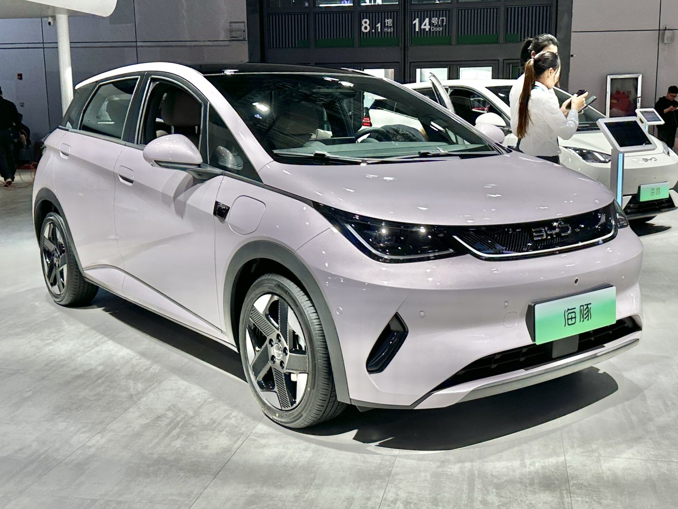 Front angled view with sharp LED headlights and distinctive alloy wheels