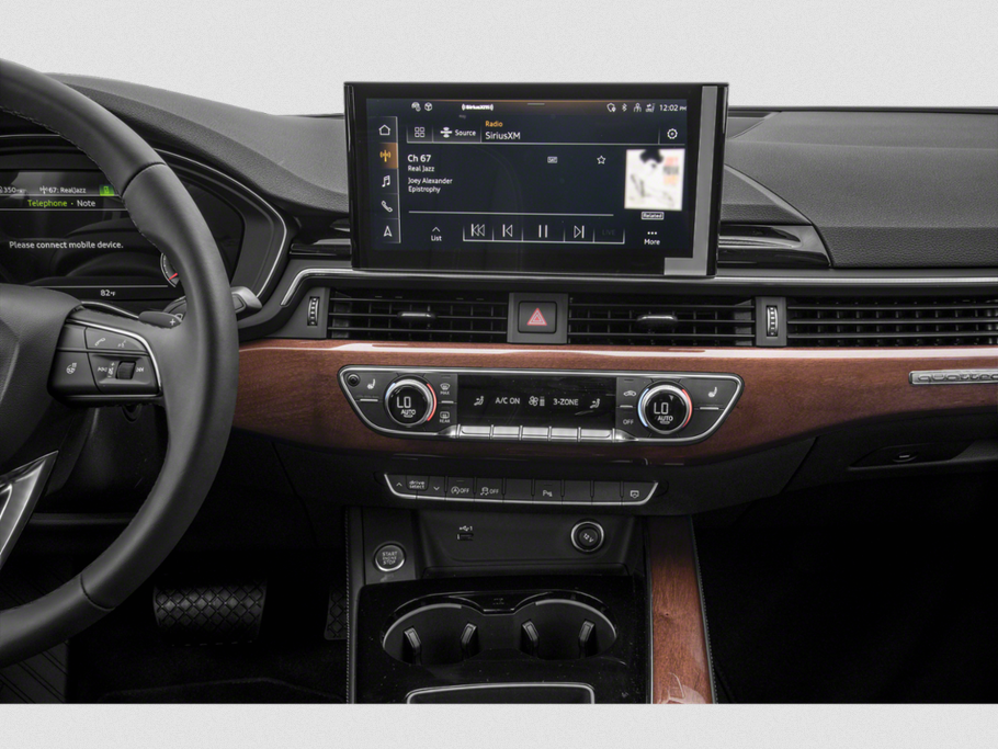 Advanced touchscreen infotainment and wood trim dashboard interior.