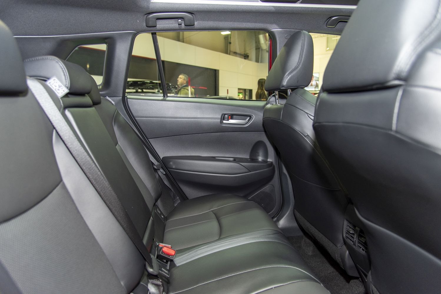 Black leather rear seats with spacious legroom and door panel