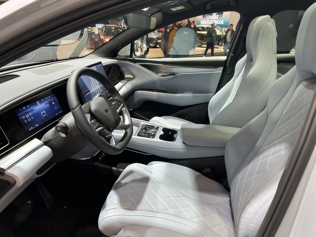 White leather seats and digital dashboard interior