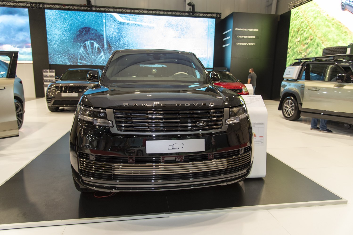 Front view with prominent grille and sleek headlights