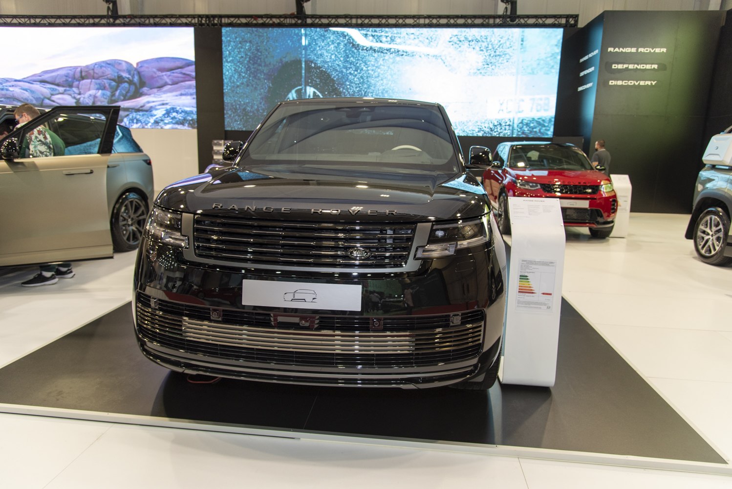 Front view of a luxury SUV with sleek grille and LED headlights