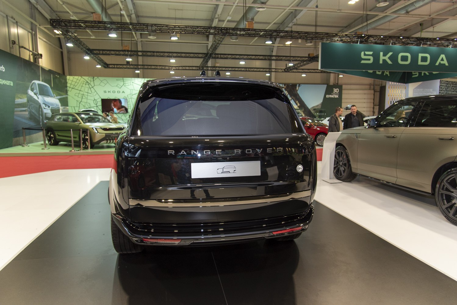 Rear perspective of sleek black SUV with Range Rover branding