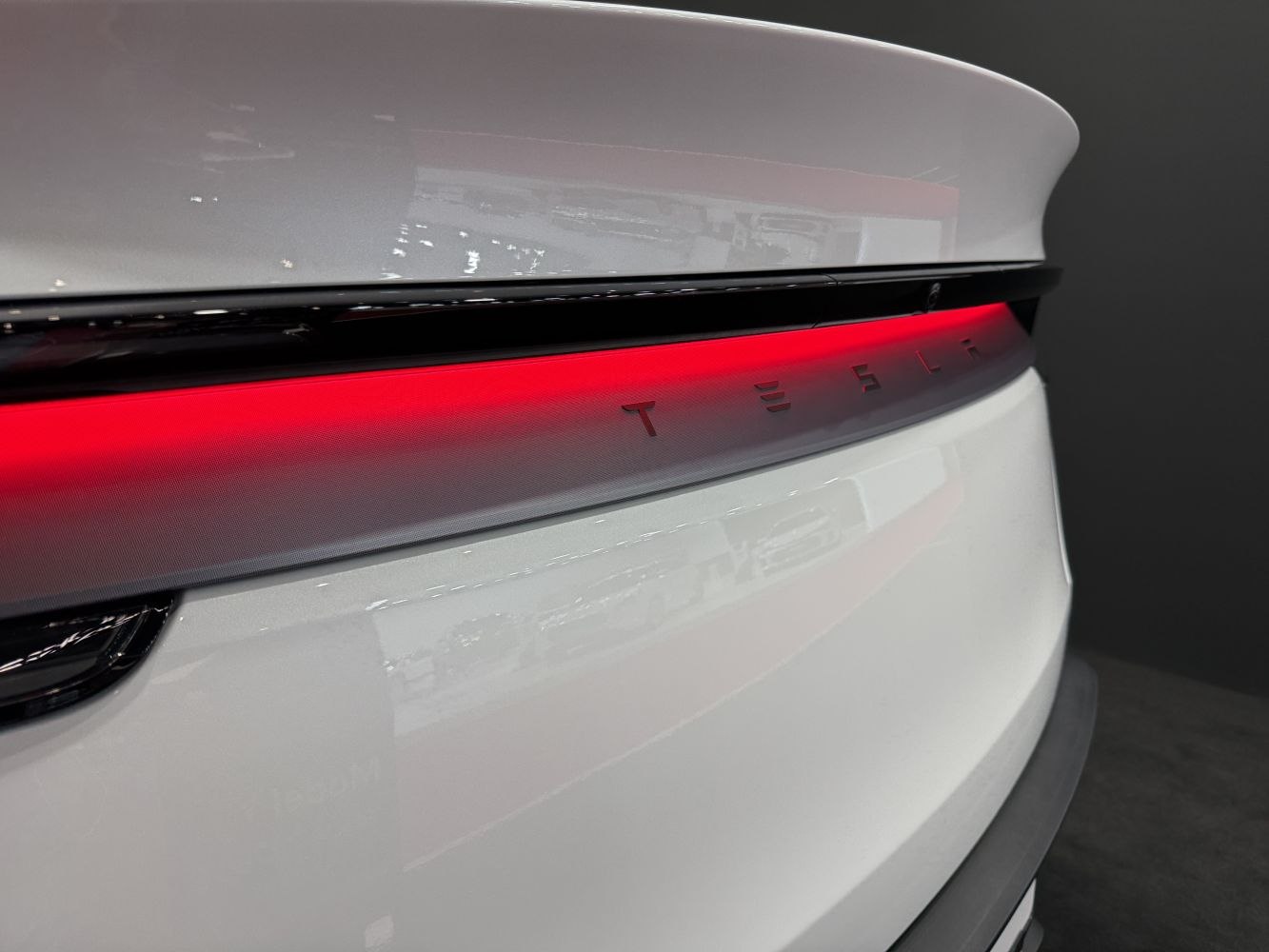 Illuminated rear light strip and tailgate design close-up