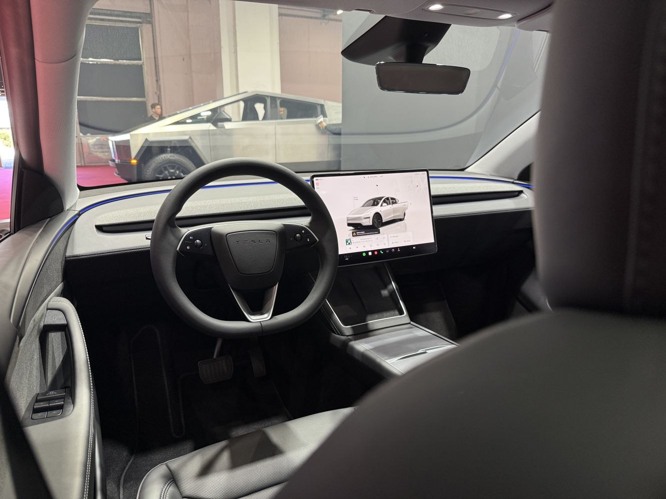 Minimalist dashboard with touchscreen and steering wheel