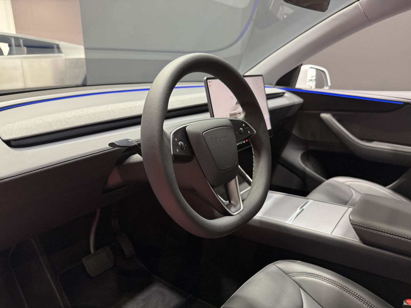 Yoke steering wheel and minimalist dashboard interior