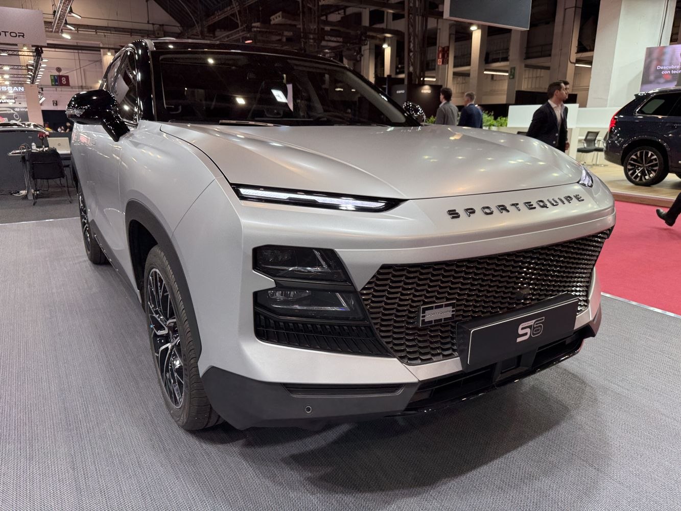 Front grille and slim LED headlights of a modern SUV
