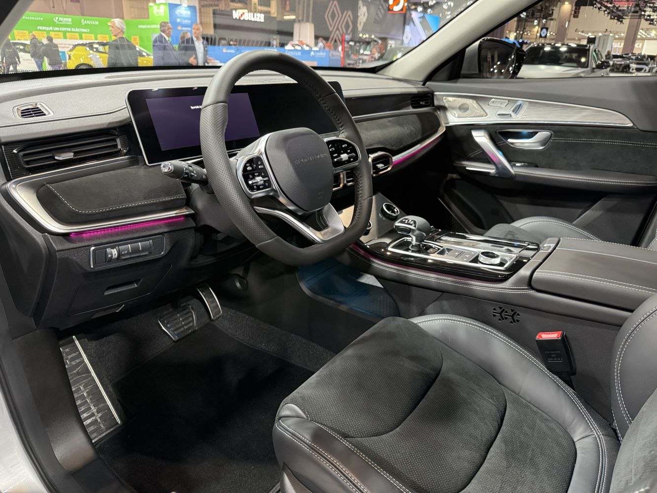 Digital cockpit, leather seats, luxury trim, modern infotainment, ambient lighting