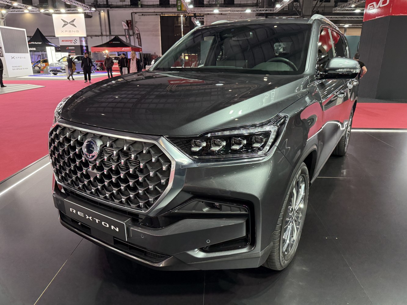Bold hexagon grille and advanced LED headlights on SUV front.