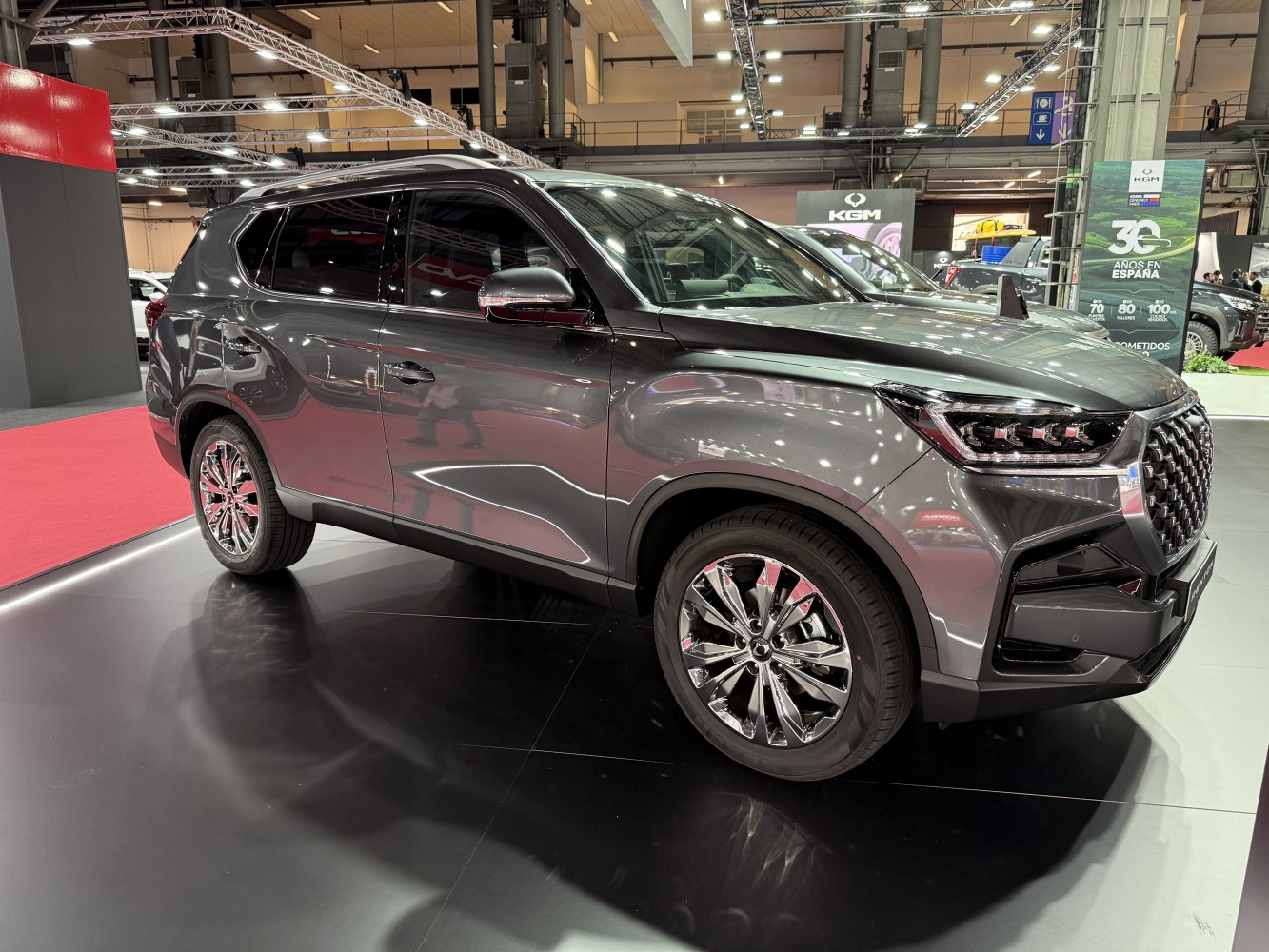 Modern LED headlights and chrome alloy wheels on a sleek SUV exterior